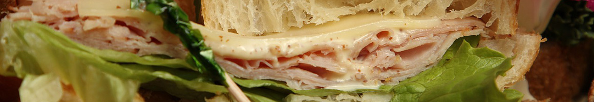 Eating Pizza Sandwich at Capri Pizza & Sub Shop restaurant in Glen Burnie, MD.